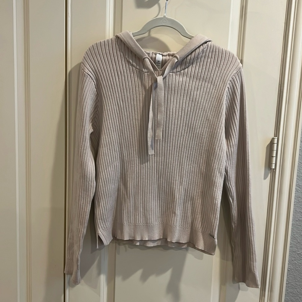 Glyder Limitless Movement Sweater with hoodie.